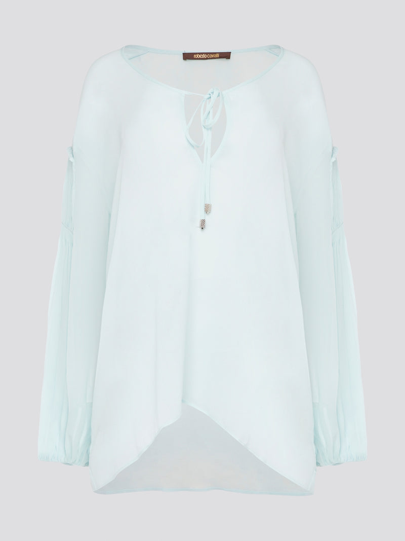 Step up your fashion game with this stunning Mint Green Tie Front Blouse by Roberto Cavalli. The delicate mint green hue and flattering tie front detail will make you stand out in any crowd. Pair it with your favorite jeans for a casual daytime look or dress it up with some sleek trousers for a night out on the town.