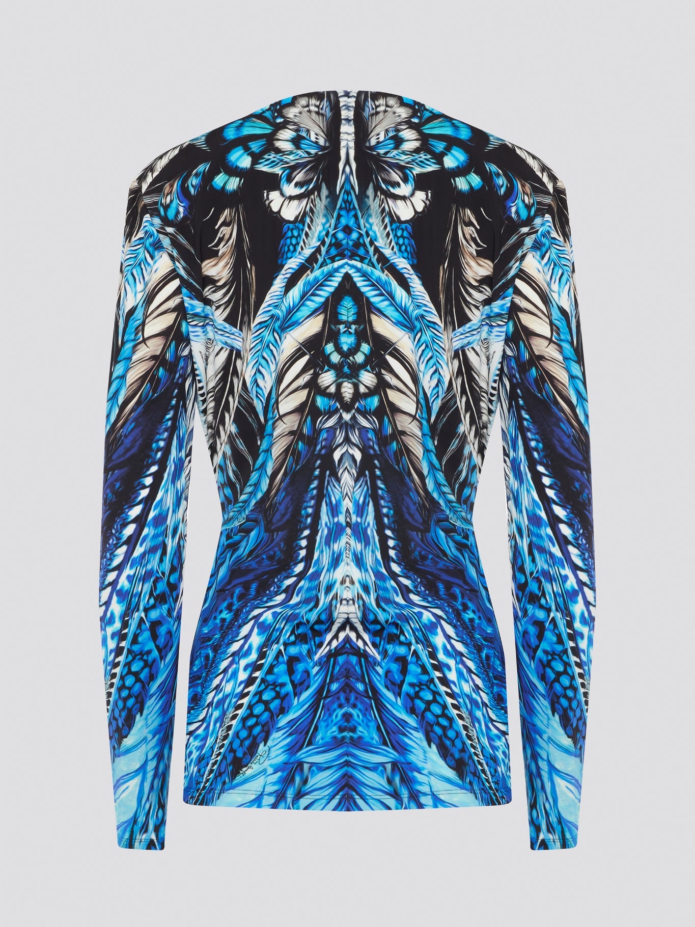 Feel like a vision of elegance in the striking Blue Lace Panel Top by Roberto Cavalli. With its luxurious lace detailing and intricate design, this top effortlessly combines sophistication with a touch of romance. Perfect for a special occasion or a night out, this piece will make you feel confident and show-stopping wherever you go. Elevate your look with this exquisite top from Roberto Cavalli.