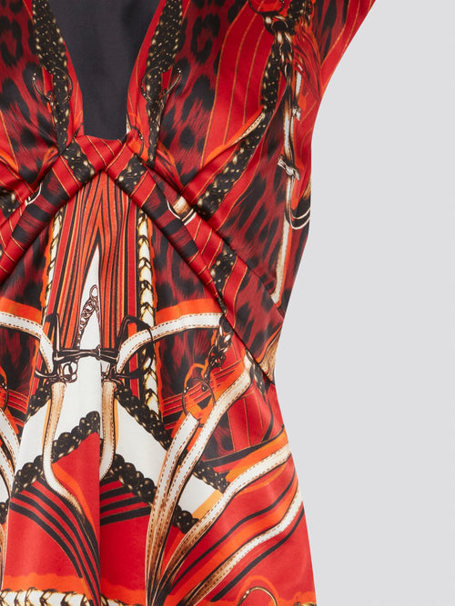 Turn heads in this vibrant red sleeveless top by Roberto Cavalli, featuring a bold and intricate print that exudes confidence and style. With a flattering silhouette and luxurious fabric, this top is perfect for elevating any outfit, whether you're dressing up for a night out or adding a pop of color to your everyday look. Make a statement and stand out from the crowd with this stunning piece from Roberto Cavalli.