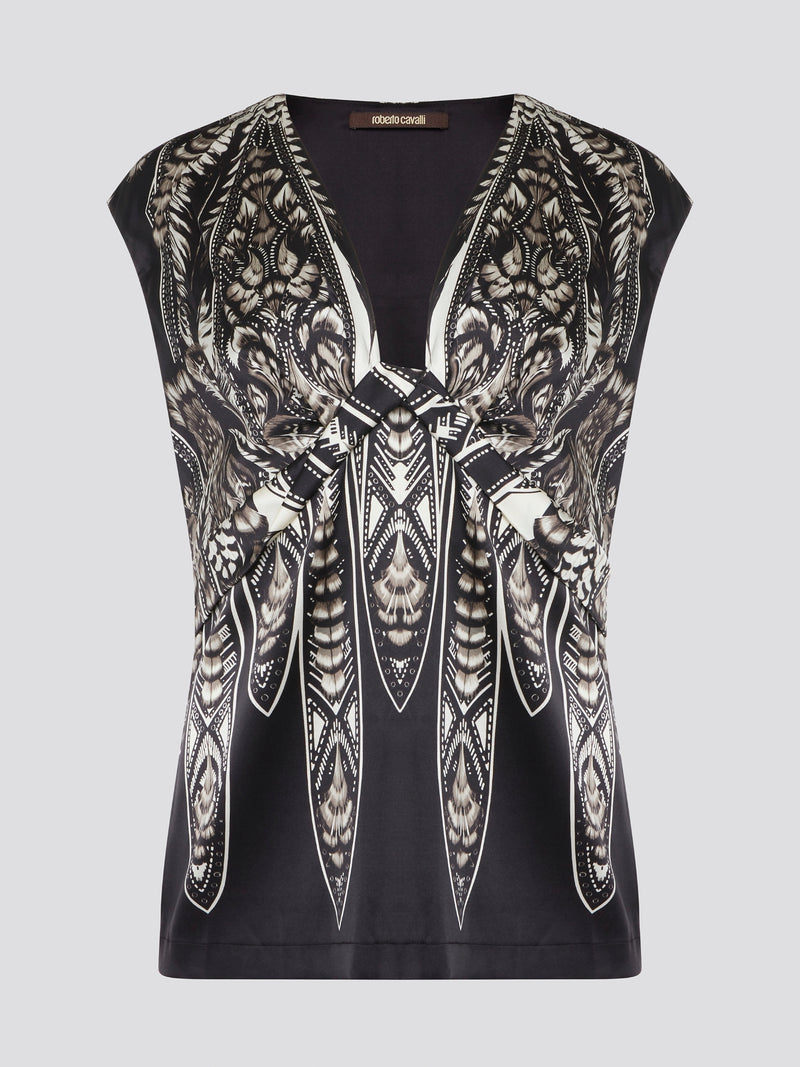 Elevate your summer wardrobe with this effortlessly chic Black Printed Sleeveless Top from Roberto Cavalli. Crafted from luxurious materials, this top features a striking print that is sure to turn heads wherever you go. Pair it with tailored pants for a sophisticated office look, or dress it down with jeans for a casual weekend ensemble.