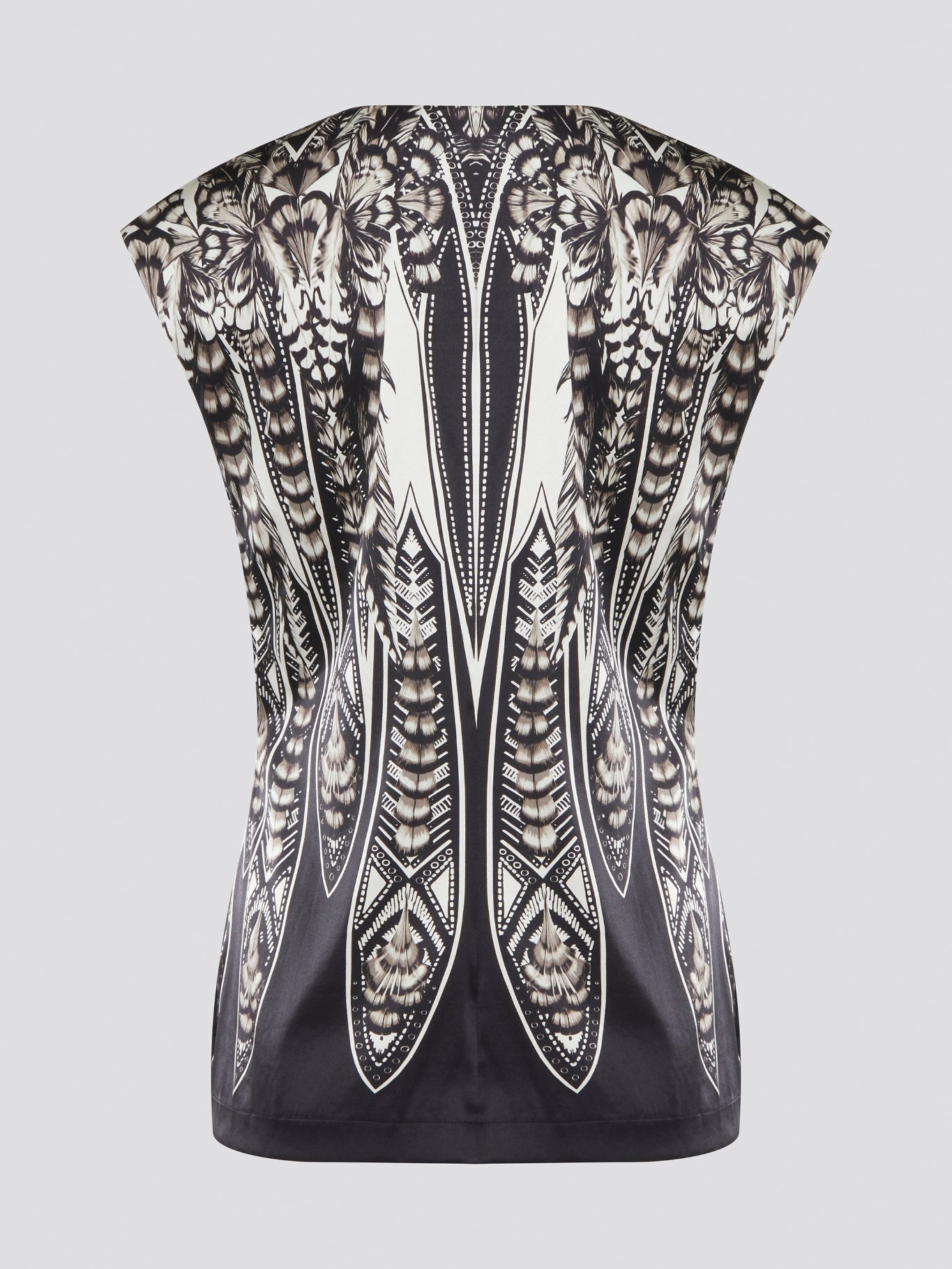 Elevate your summer wardrobe with this effortlessly chic Black Printed Sleeveless Top from Roberto Cavalli. Crafted from luxurious materials, this top features a striking print that is sure to turn heads wherever you go. Pair it with tailored pants for a sophisticated office look, or dress it down with jeans for a casual weekend ensemble.