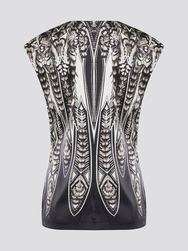 Elevate your summer wardrobe with this effortlessly chic Black Printed Sleeveless Top from Roberto Cavalli. Crafted from luxurious materials, this top features a striking print that is sure to turn heads wherever you go. Pair it with tailored pants for a sophisticated office look, or dress it down with jeans for a casual weekend ensemble.