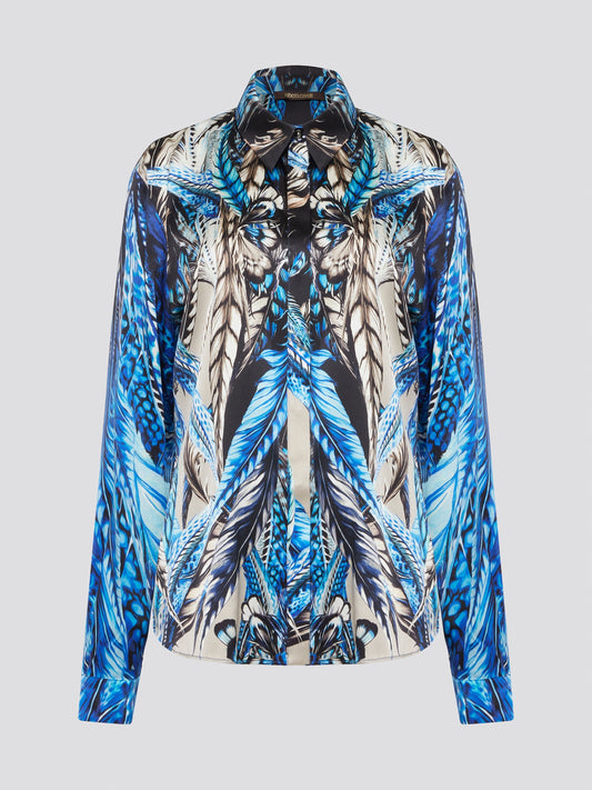 Elevate your wardrobe with the stunning Blue Printed Long Sleeve Blouse by Roberto Cavalli. Featuring a bold and striking print, this blouse is perfect for making a statement wherever you go. Crafted with exquisite attention to detail, this piece will add a touch of luxury and sophistication to any outfit.