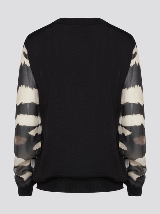 Make a fierce fashion statement with the Roberto Cavalli Zebra Print Sweatshirt, featuring a bold and eye-catching zebra print design. Crafted from premium materials, this sweatshirt offers both style and comfort for all-day wear. Elevate your street style with this standout piece that is sure to turn heads wherever you go.