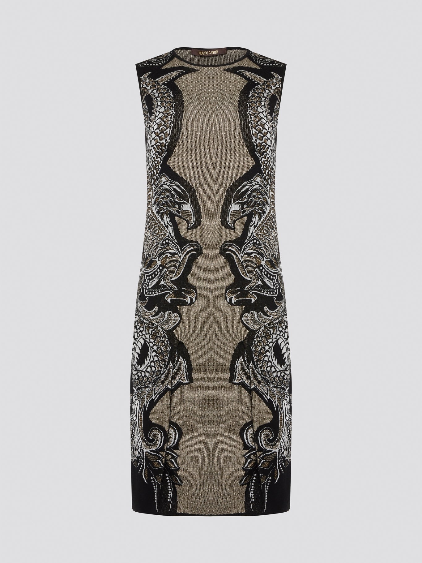 Elevate your wardrobe with the exquisite Knitted Bodycon Dress by Roberto Cavalli. Crafted with precision and care, this dress features intricate knitted details that hug your curves in all the right places. Make a statement at any event with this luxurious and unique piece that exudes elegance and style.