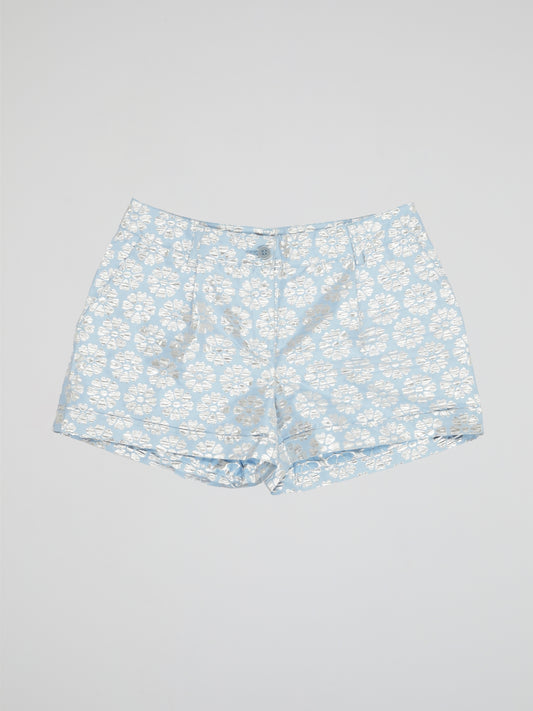Transport yourself to a whimsical garden with these Blue Floral Print Shorts by Parosh. Made from luxurious fabric, these shorts feature a vibrant blue hue adorned with intricate floral designs for a statement-making look. Perfect for exploring the city or lounging in the sun, these shorts are a must-have addition to your wardrobe.