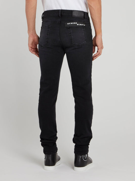 Выбеленные джинсы с рваной отделкой