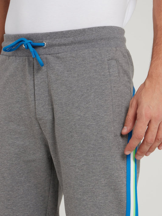 Серые брюки из флиса с лампасами