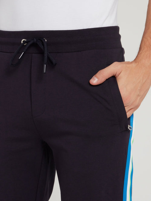 Темно-синие брюки из флиса с лампасами