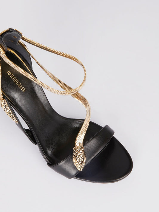 Черные кожаные босоножки с декором в виде змеи