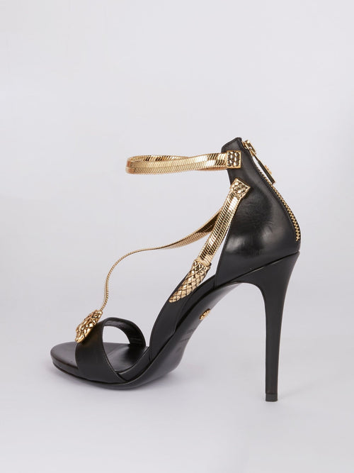 Черные кожаные босоножки с декором в виде змеи
