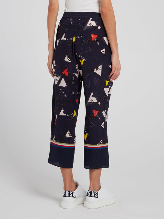 Темно-синие расклешенные капри