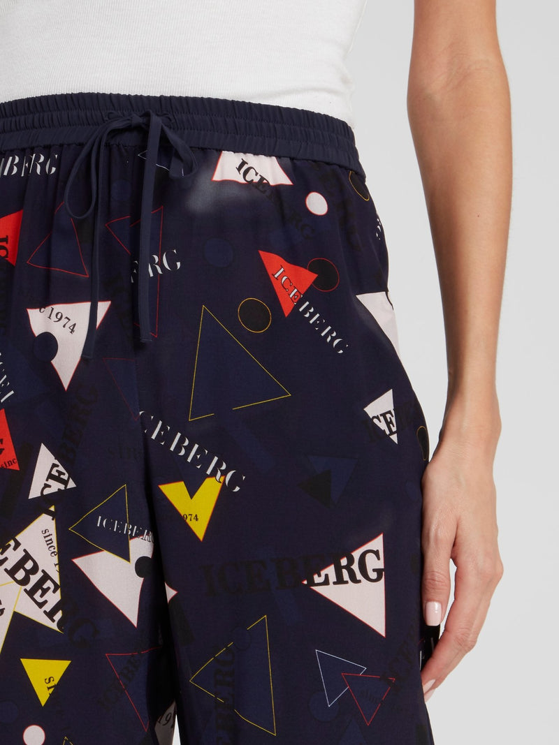 Темно-синие расклешенные капри