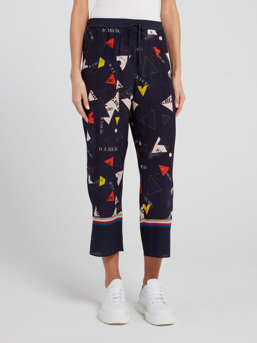 Темно-синие расклешенные капри