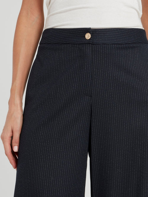 Темно-синие брюки палаццо в тонкую полоску