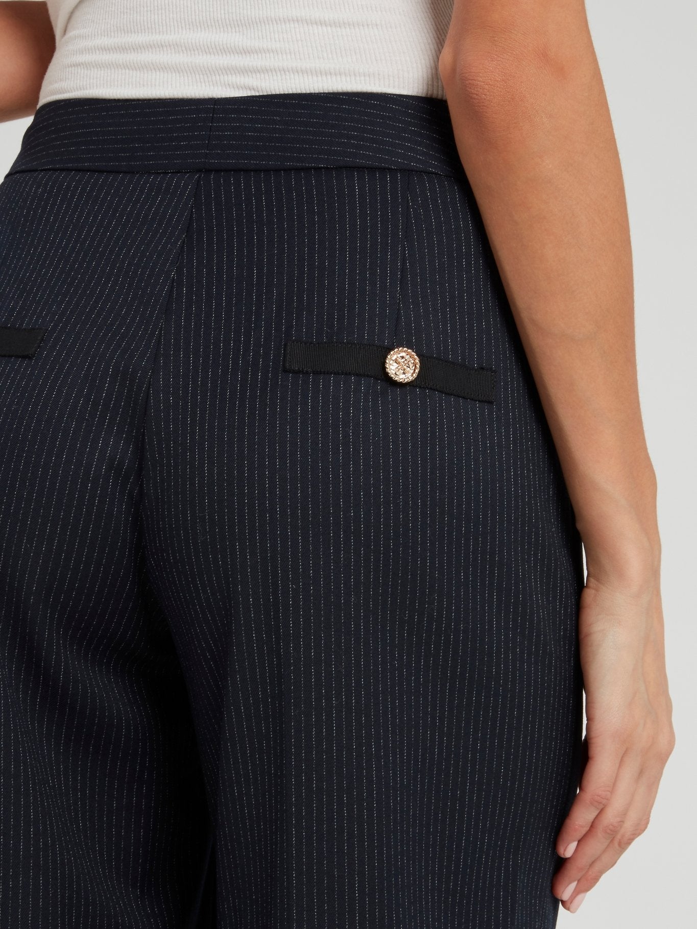 Темно-синие брюки палаццо в тонкую полоску