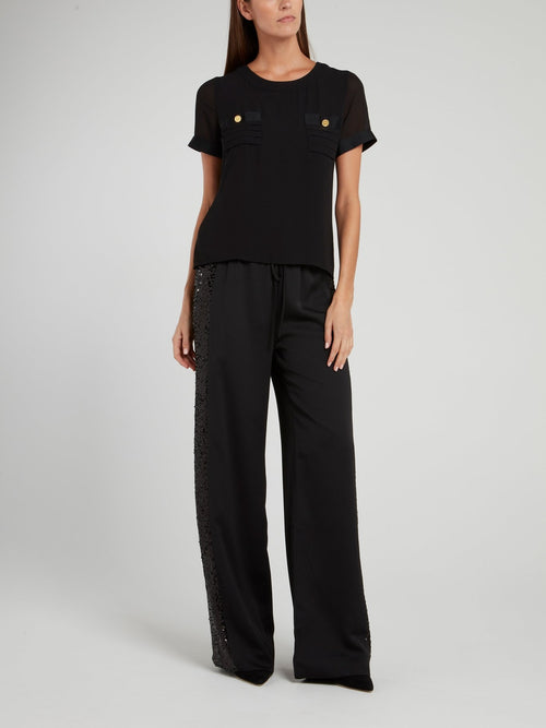 Черные широкие брюки с пайетками