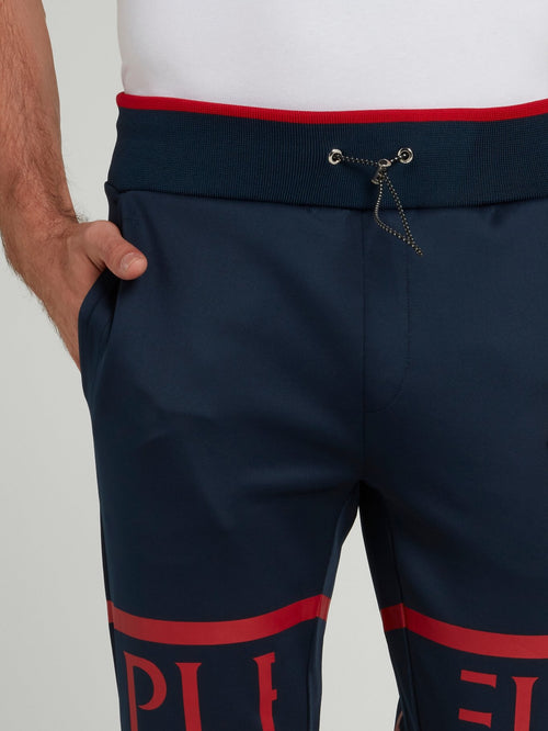 Темно-синие спортивные брюки с логотипом