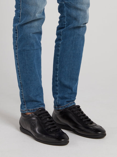 Черные низкие кожаные кроссовки