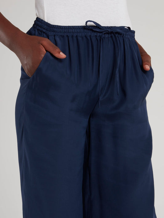 Темно-синие брюки палаццо со шнурком