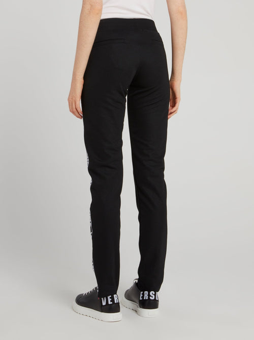 Черные спортивные брюки на резинке с логотипом