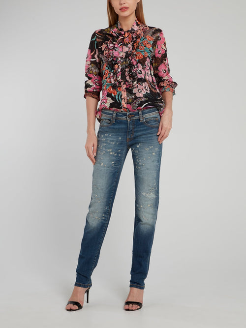 Темно-синие джинсы с рваной отделкой