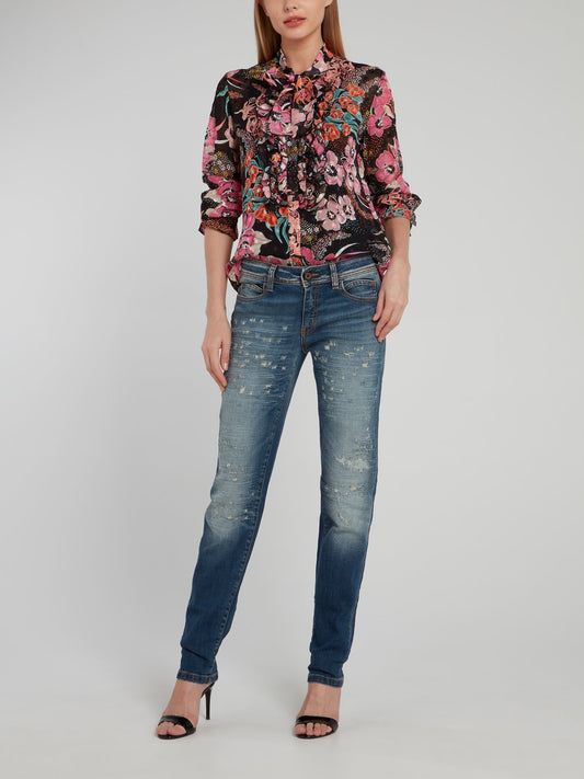 Темно-синие джинсы с рваной отделкой