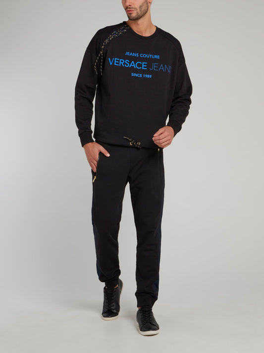 Черные спортивные брюки с молниями на карманах