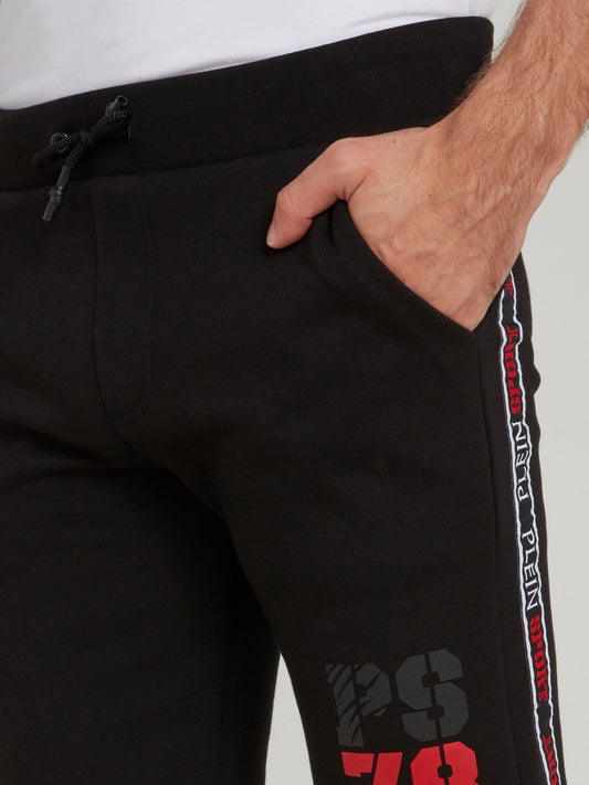 Черные спортивные шорты с лампасами