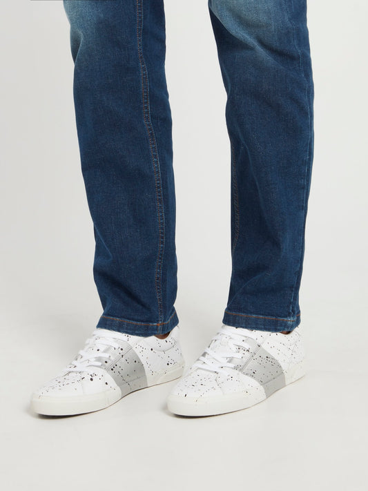 Кроссовки с принтом "брызги красок"