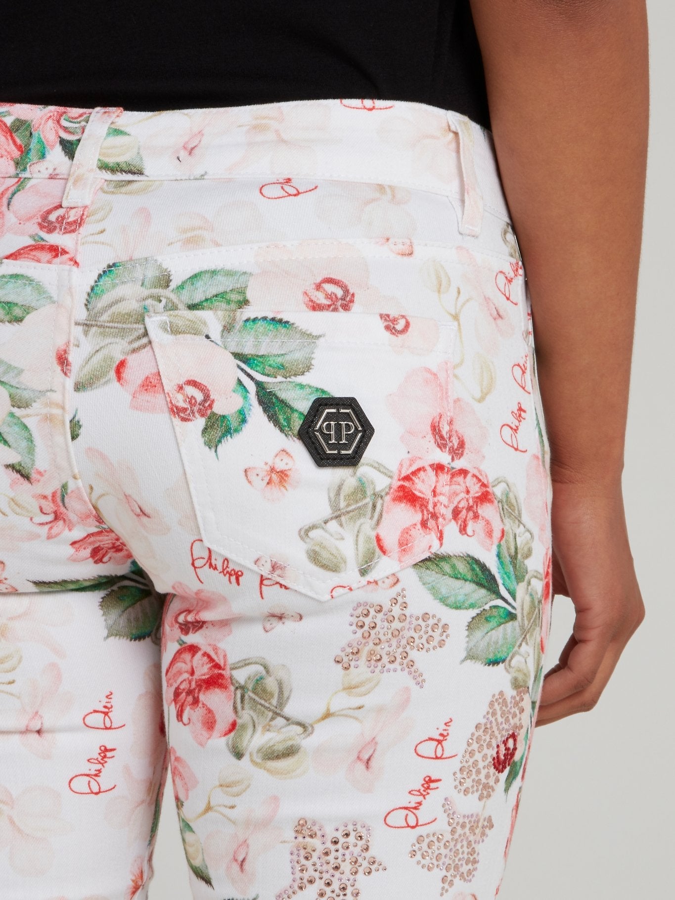 Джинсы скинни с цветочным принтом и логотипом