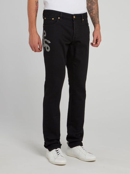 Черные прямые джинсы с изображением змеи