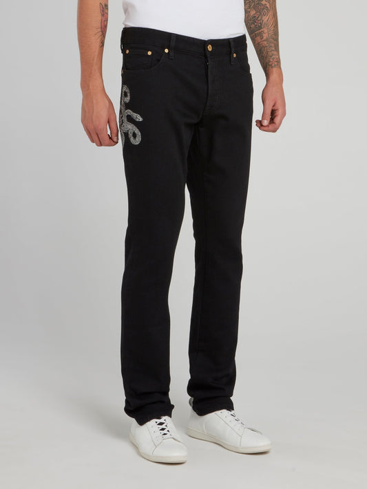 Черные прямые джинсы с изображением змеи