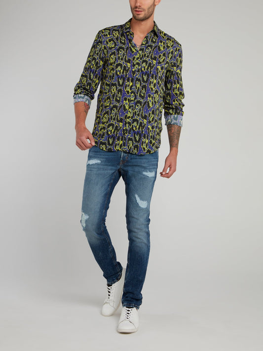 Синие зауженные джинсы с рваной отделкой