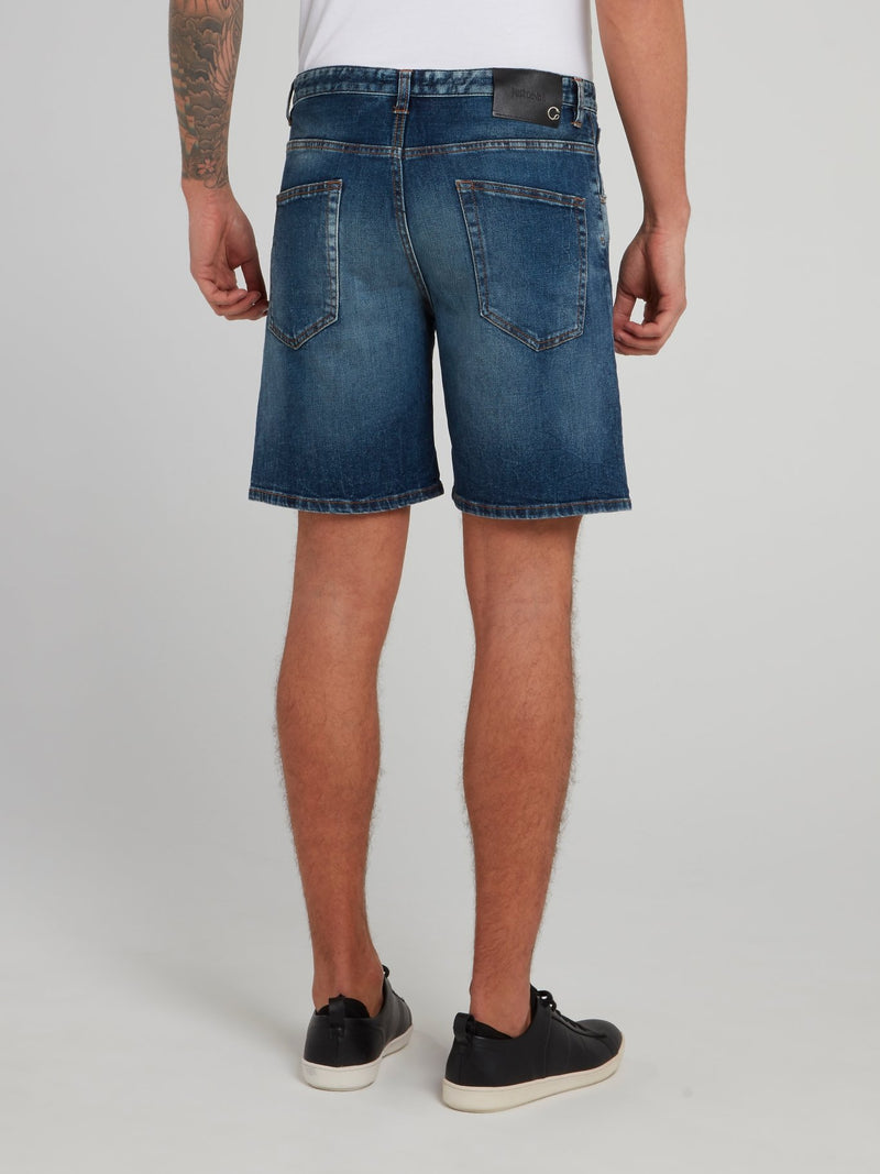 Синие джинсовые шорты с рваной отделкой