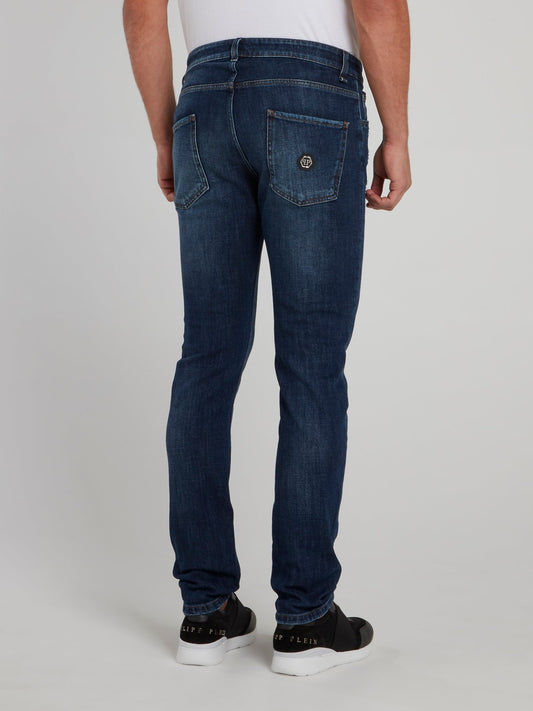 Выбеленные джинсы с рваной отделкой