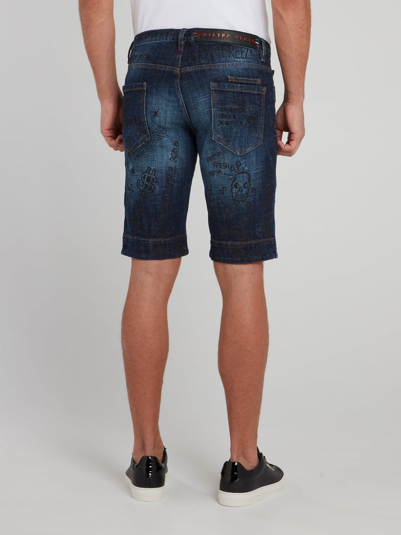 Темно-синие джинсовые бермуды с рваной отделкой