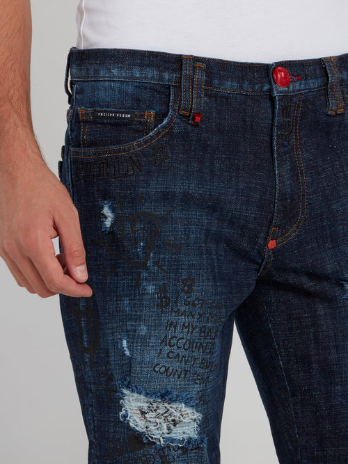 Темно-синие джинсовые бермуды с рваной отделкой