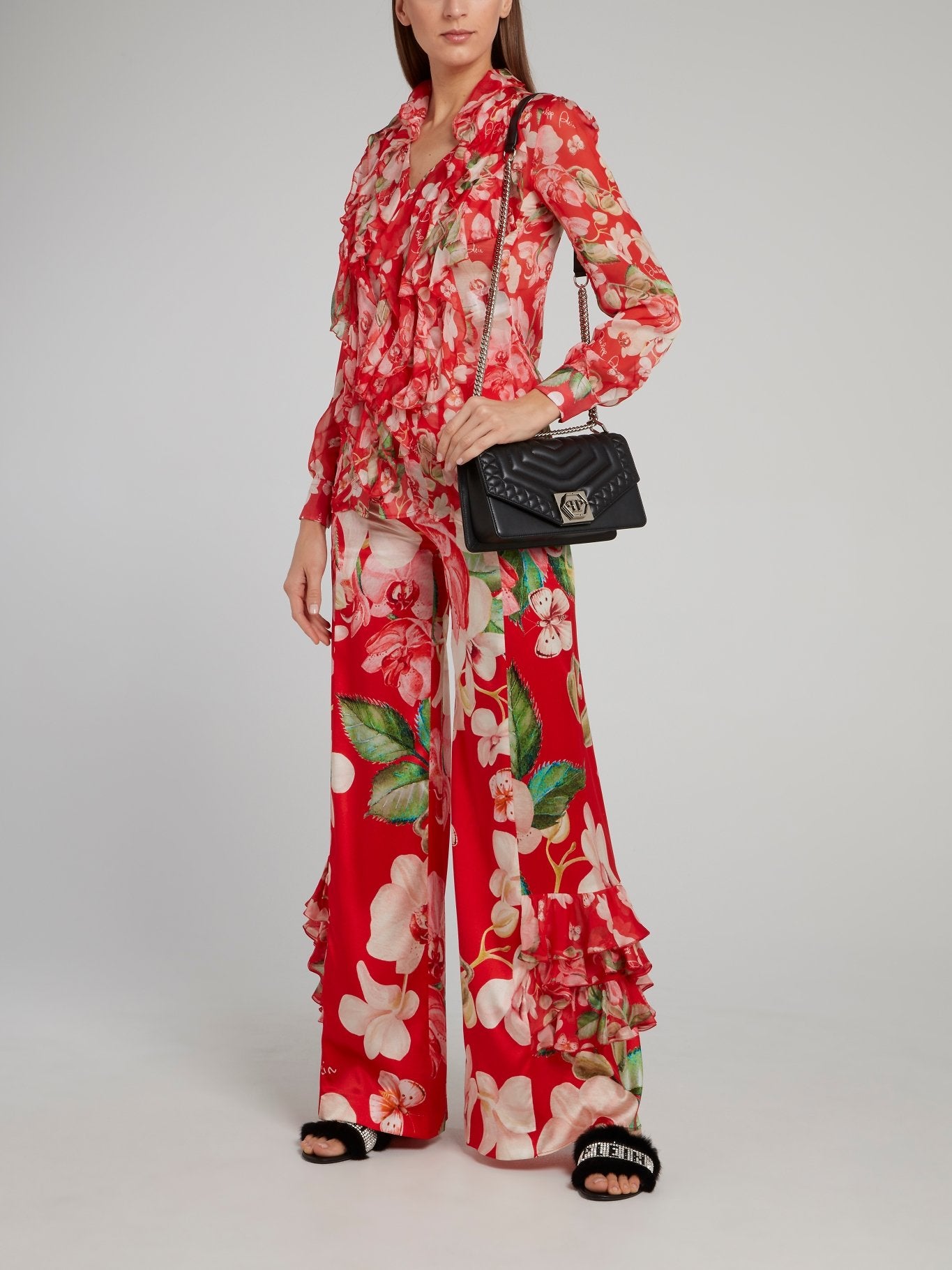 Красные расклешенные брюки с оборками и цветочным принтом