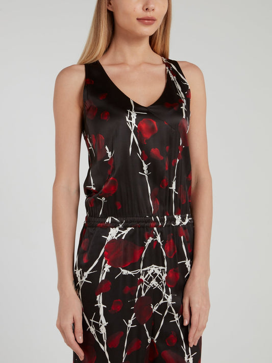 Черный комбинезон с цветочным принтом и вырезом на спине