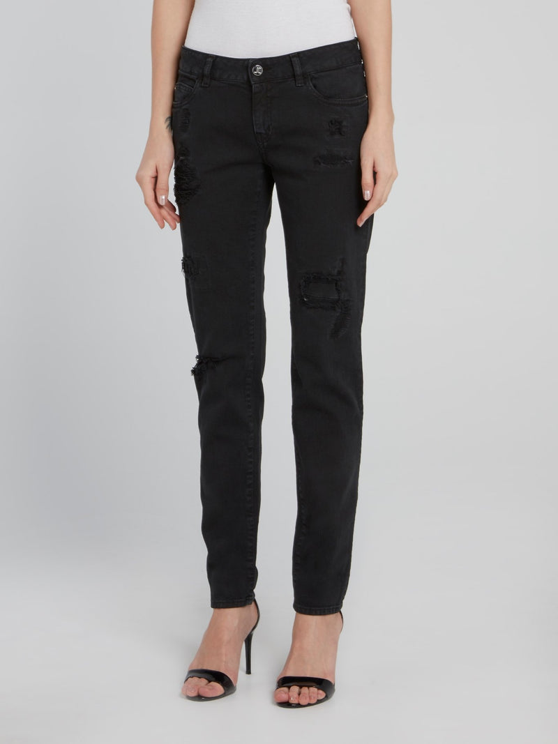 Черные джинсы с рваной отделкой