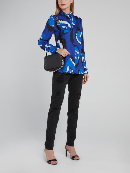 Черные джинсы с рваной отделкой