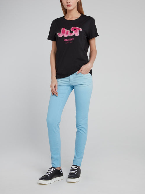 Голубые джинсы скинни с отделкой на карманах