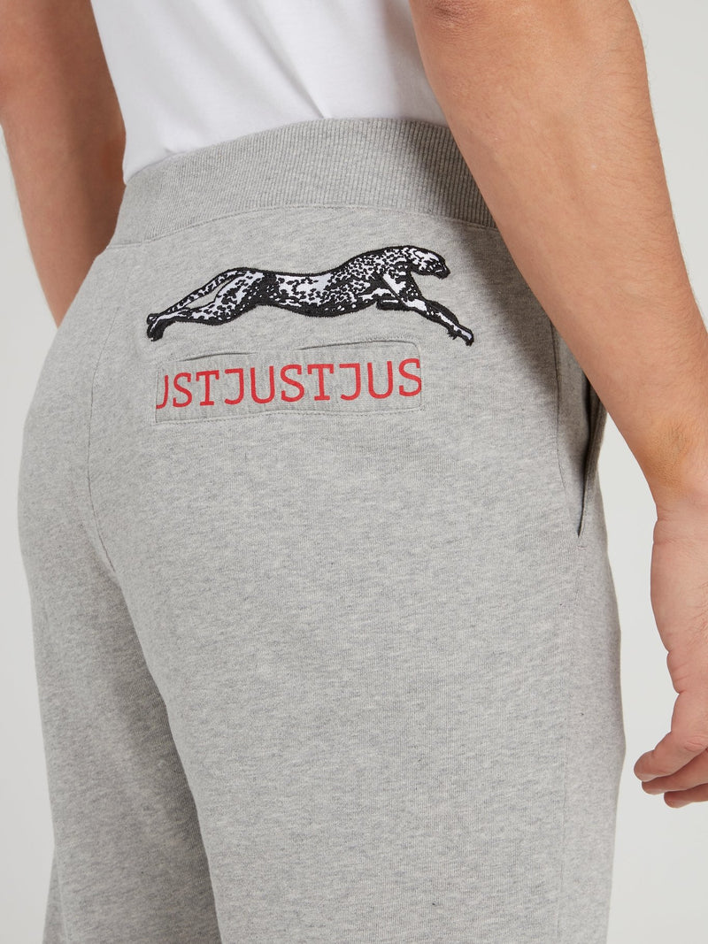 Серые спортивные брюки со шнурком и логотипом