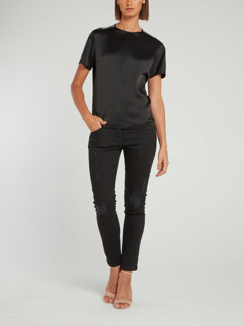 Черная блузка с короткими рукавами и вставками из пайеток