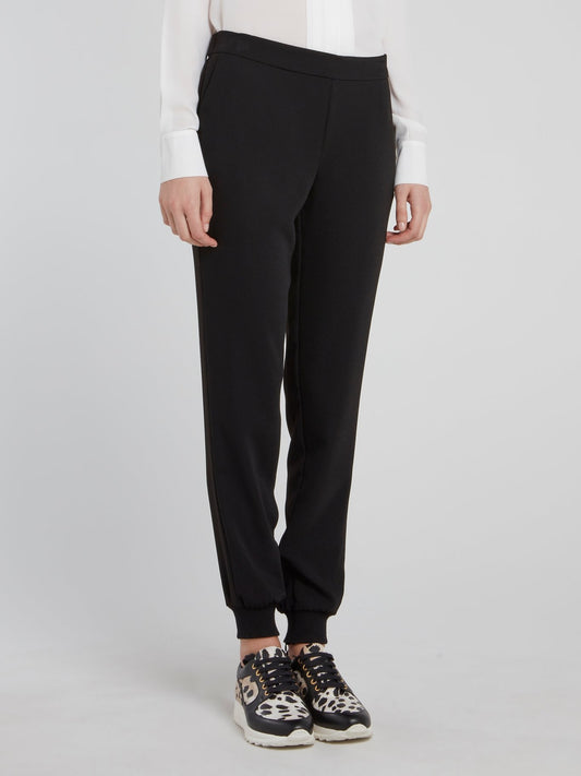 Черные спортивные брюки на резинке