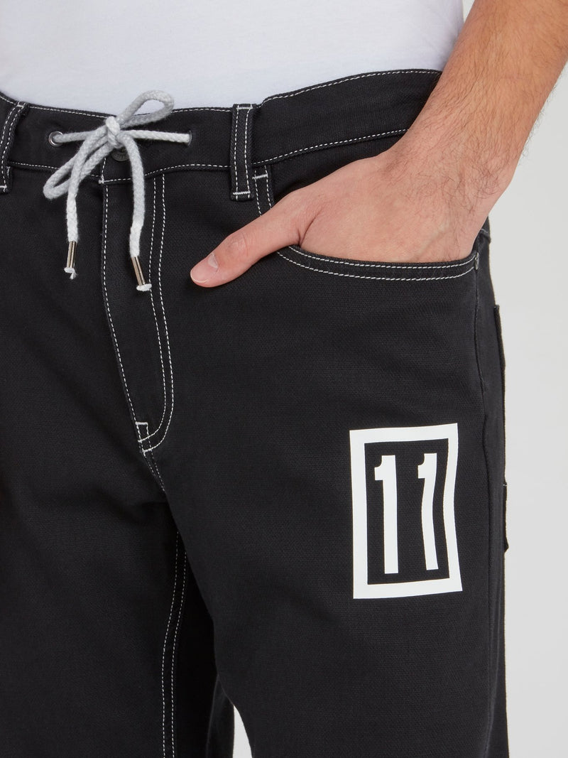 Черные джинсы на шнуровке