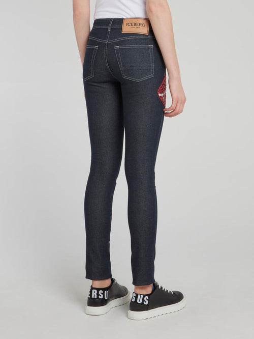 Выбеленные джинсы скинни с изображением губ из пайеток