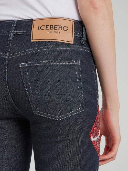 Выбеленные джинсы скинни с изображением губ из пайеток