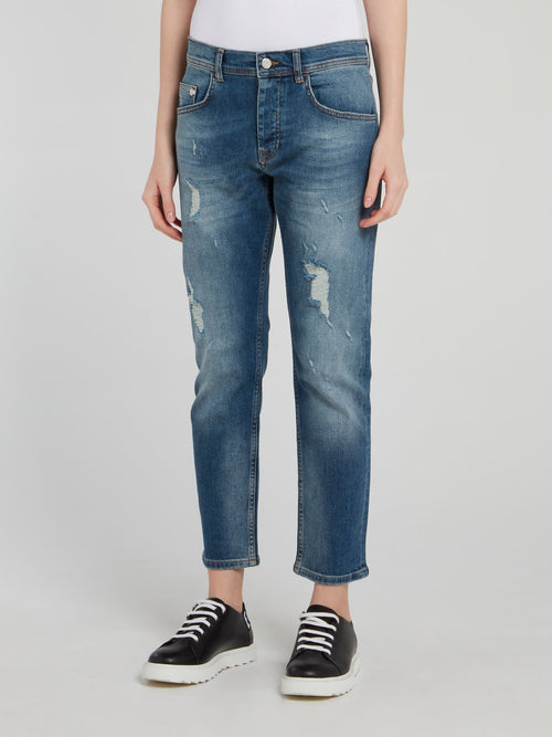 Синие джинсы-бойфренды с рваной отделкой